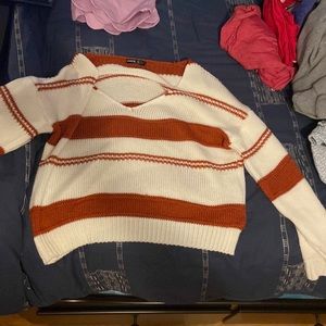 Striped orange and white sweater